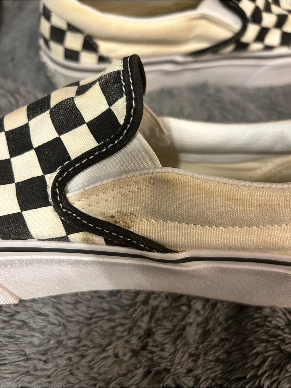 Vans Checkerboard Slip-On Sneakers in Black and White